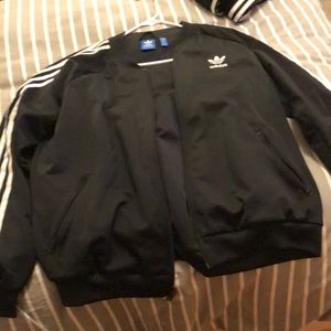 Adidas track Jacket. Men’s XL, black and white. Zipper pockets. Great condition